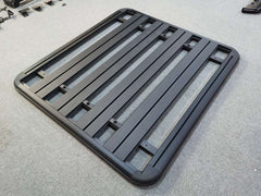 Modular roof platform with tie-down slots on Toyota Hilux